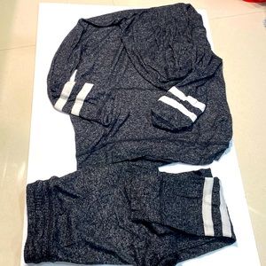 This matching set includes pants with pockets as well as a hoodie with pockets